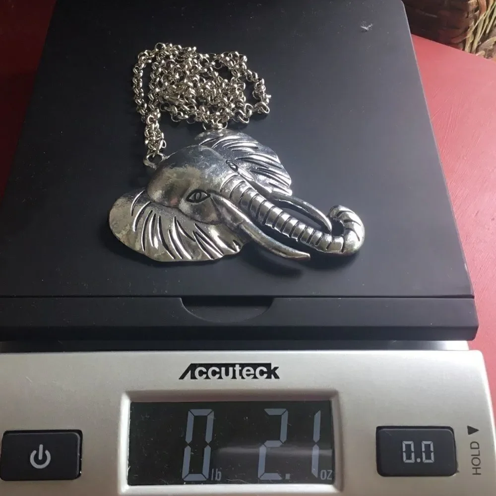 $12 or 3/$25 Silvertone Elephant Necklace Set